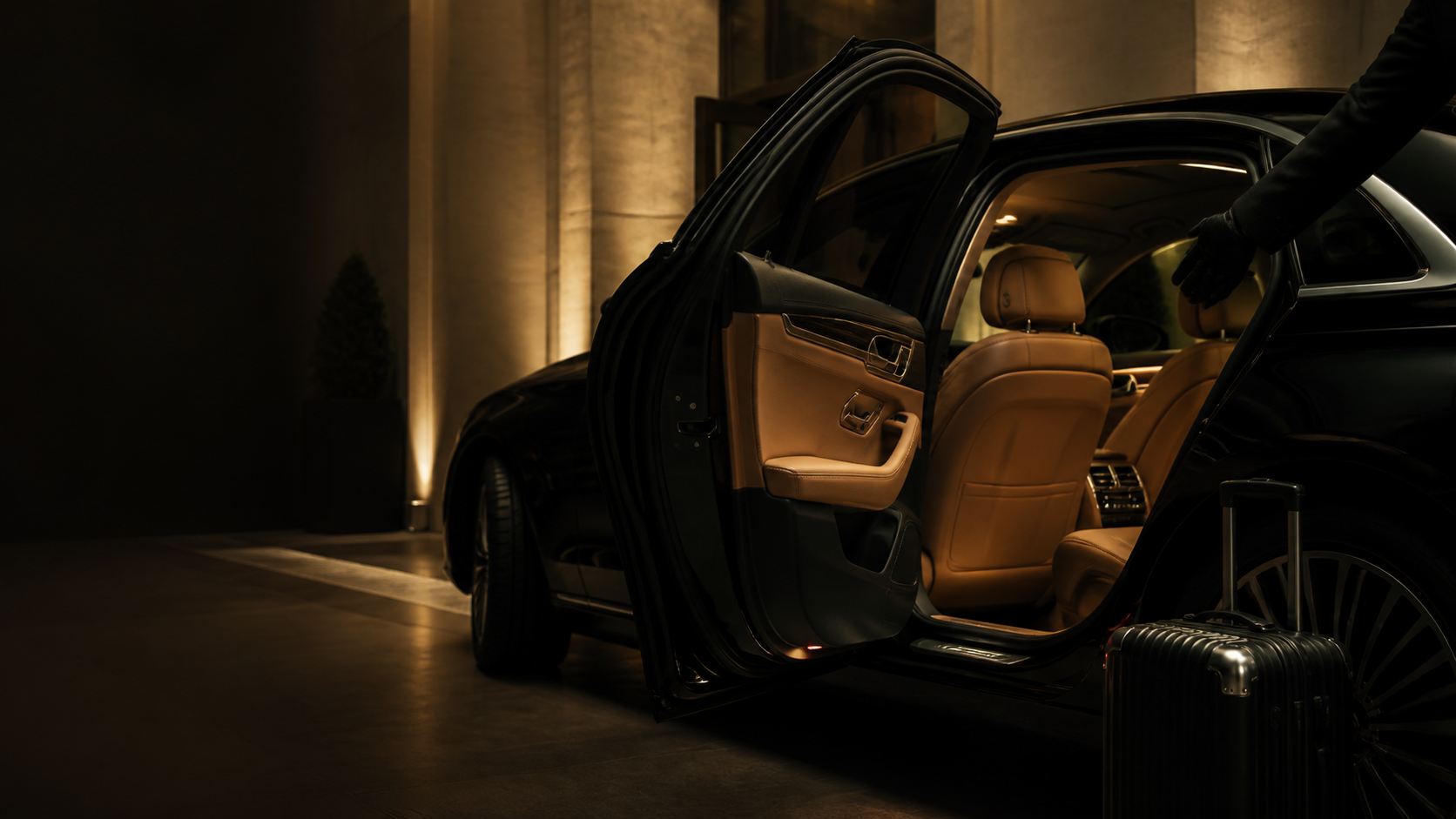 Illustration of an open executive car door, a welcoming chauffeur, and a warm leather interior